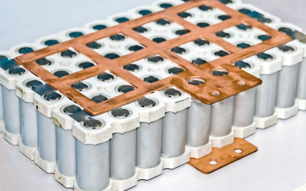 electric car lithium ion battery sits on surface 