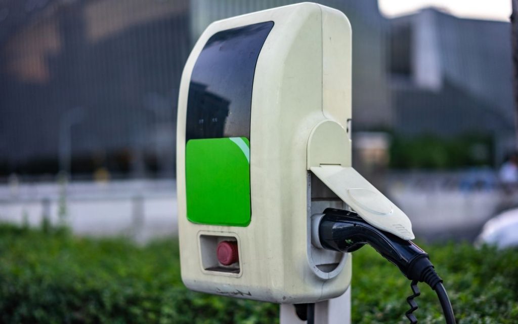 electric car charging port sits outside 