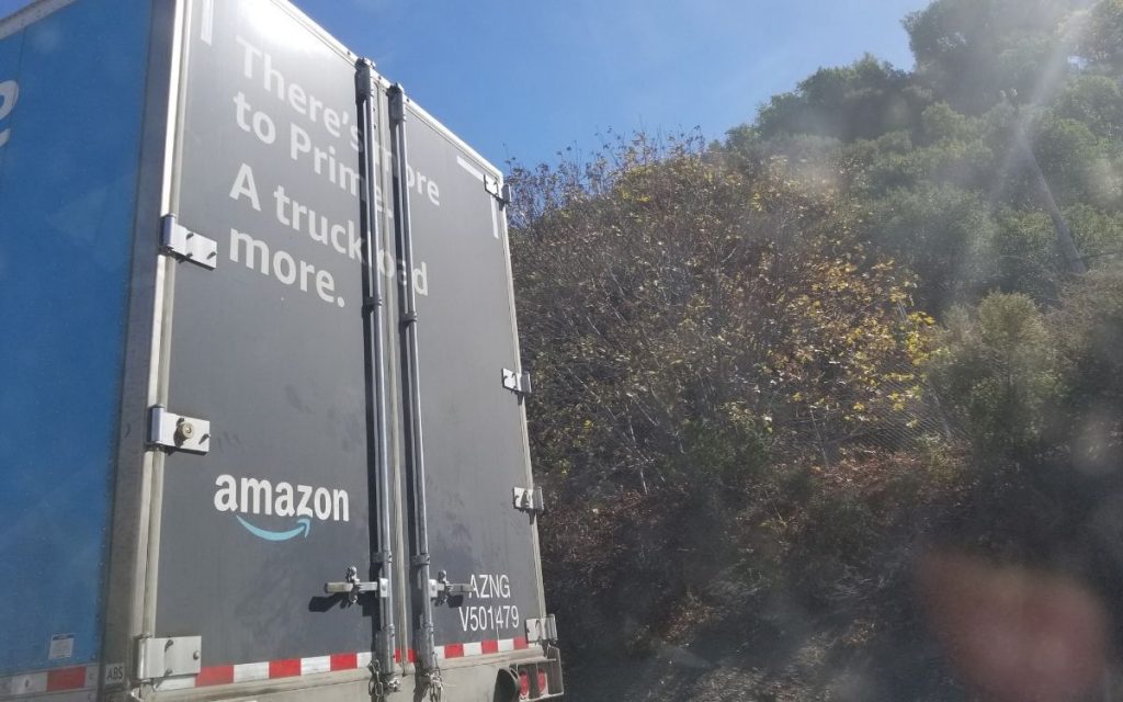amazon truck driving away 